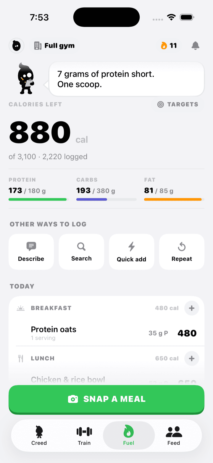 The Fuel tab with calorie and macro rings above the day's meals.